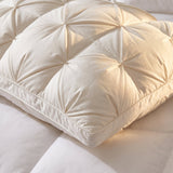 Close-up of the pinch-pleat pillow top and piped gusset border