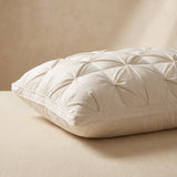 Rectangular goose down pillow showing its deep loft and piped edge