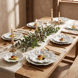 Kajabi Plate Collection styled in a fine-dining tablescape on white oak