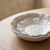 Close-up of the crushed-silk texture on the Kajabi Plate Collection