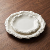 Rockdon Plate Collection — sculptural gallery view on a warm wood table