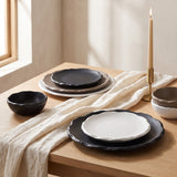 The full Stone Age Plate Collection in matte black, white and taupe