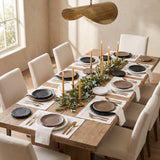 Stone Age Plate Collection styled in a warm dining room