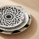 Jabr Plate Collection — black-and-white marble geometric plates with gold rims