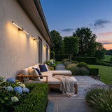 Luminous Line Outdoor Lights mounted above outdoor lounge seating at dusk
