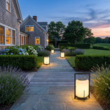 Lampara Outdoor Light (Solar) lighting a stone garden path at dusk