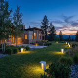 Block Lane Outdoor Solar Light spread across an estate lawn at dusk