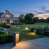 Block Lane Outdoor Solar Light spread across an estate lawn at dusk