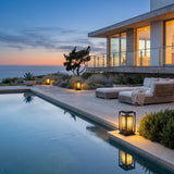 Cage Post Light (Outdoor Solar) lining a poolside terrace at dusk