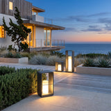 Garden Lantern (Solar) glowing on a luxury estate terrace at dusk