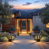 A matched pair of Nimbus Light lighting a front entrance at dusk