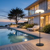 Signature Outdoor Solar Lamp lining a poolside terrace at dusk