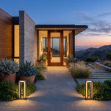 A matched pair of Prism Pathway Light (Outdoor Solar) lighting a front entrance at dusk