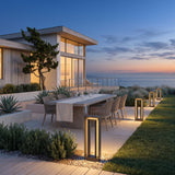 Prism Pathway Light (Outdoor Solar) lighting an outdoor dining terrace at dusk