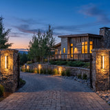 Cascade Wall Light mounted on masonry gate piers at dusk