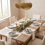Jabr Plate Collection styled in a warm dining room