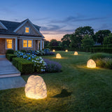 Garden Stone Outdoor Lights spread across an estate lawn at dusk