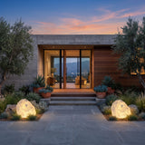 A matched pair of Garden Stone Outdoor Lights lighting a front entrance at dusk