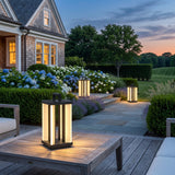 Contemporary Lamp portable outdoor solar lantern glowing on a terrace table at dusk