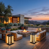 Contemporary Lamp lanterns around an outdoor fire pit seating area at dusk