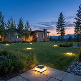 Flat Out Lights spread across an estate lawn at dusk