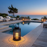 Lantern Sora Weave lanterns set along a pool edge at dusk