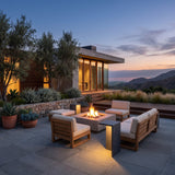 Block Lane Outdoor Solar Light around an outdoor fire pit seating area at dusk