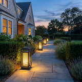 Cage Post Light (Outdoor Solar) lighting a stone garden path at dusk