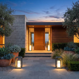 A matched pair of Garden Lantern (Solar) lighting a front entrance at dusk