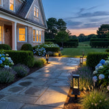 Nimbus Light lighting a stone garden path at dusk