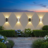 The full Sunset Wall Light range shown together — oval and rectangle, white and black
