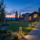 Prism Pathway Light (Outdoor Solar) spread across an estate lawn at dusk