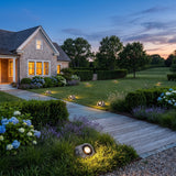 Rocky Light (Outdoor Solar) spread across an estate lawn at dusk