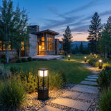 Nimbus Cube Solar Light spread across an estate lawn at dusk