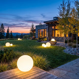 Element Lamp spread across an estate lawn at dusk