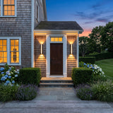 A matched pair of Cascade Wall Light flanking a front door at dusk