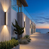 A run of Cascade Wall Light along a house facade at dusk