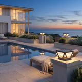 Glow Beam Outdoor Light (Solar) lining a poolside terrace at dusk