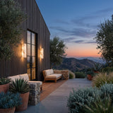 Marble Outdoor Wall Light mounted above outdoor lounge seating at dusk